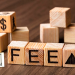 Wooden blocks with the word 'fee'
