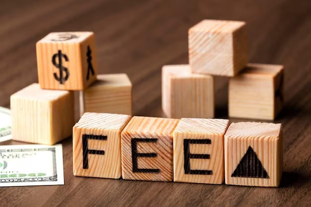 Wooden blocks with the word 'fee'